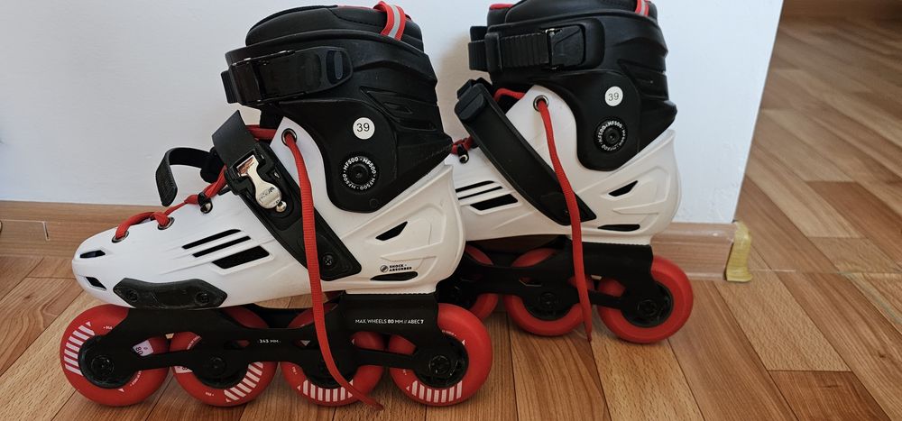 Роликовые коньки