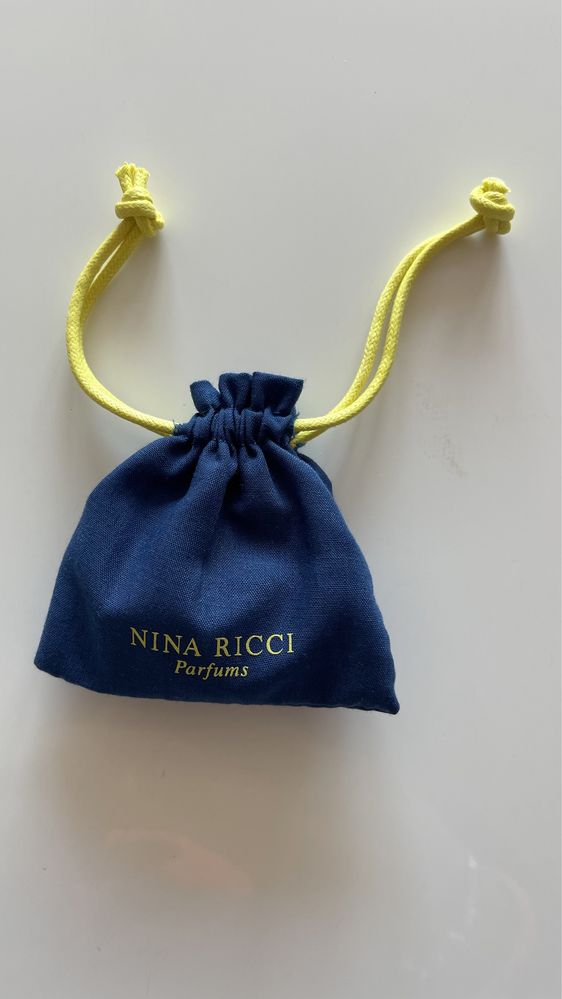 Гривна с талисмани на Nina Ricci