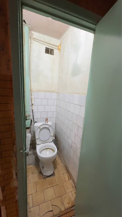 Кибрай байткурган  2 комнатная 77я серия кирпичный дом