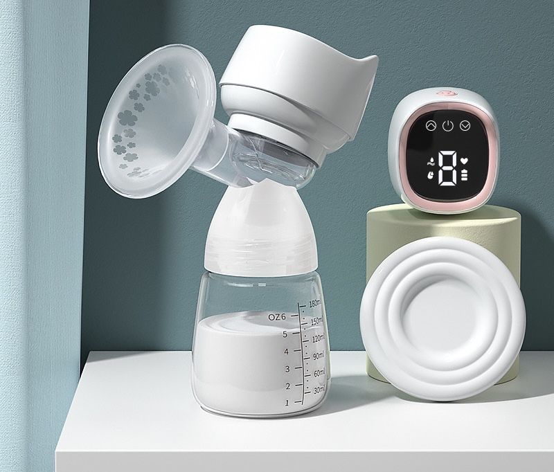 Электрический молокоотсос,