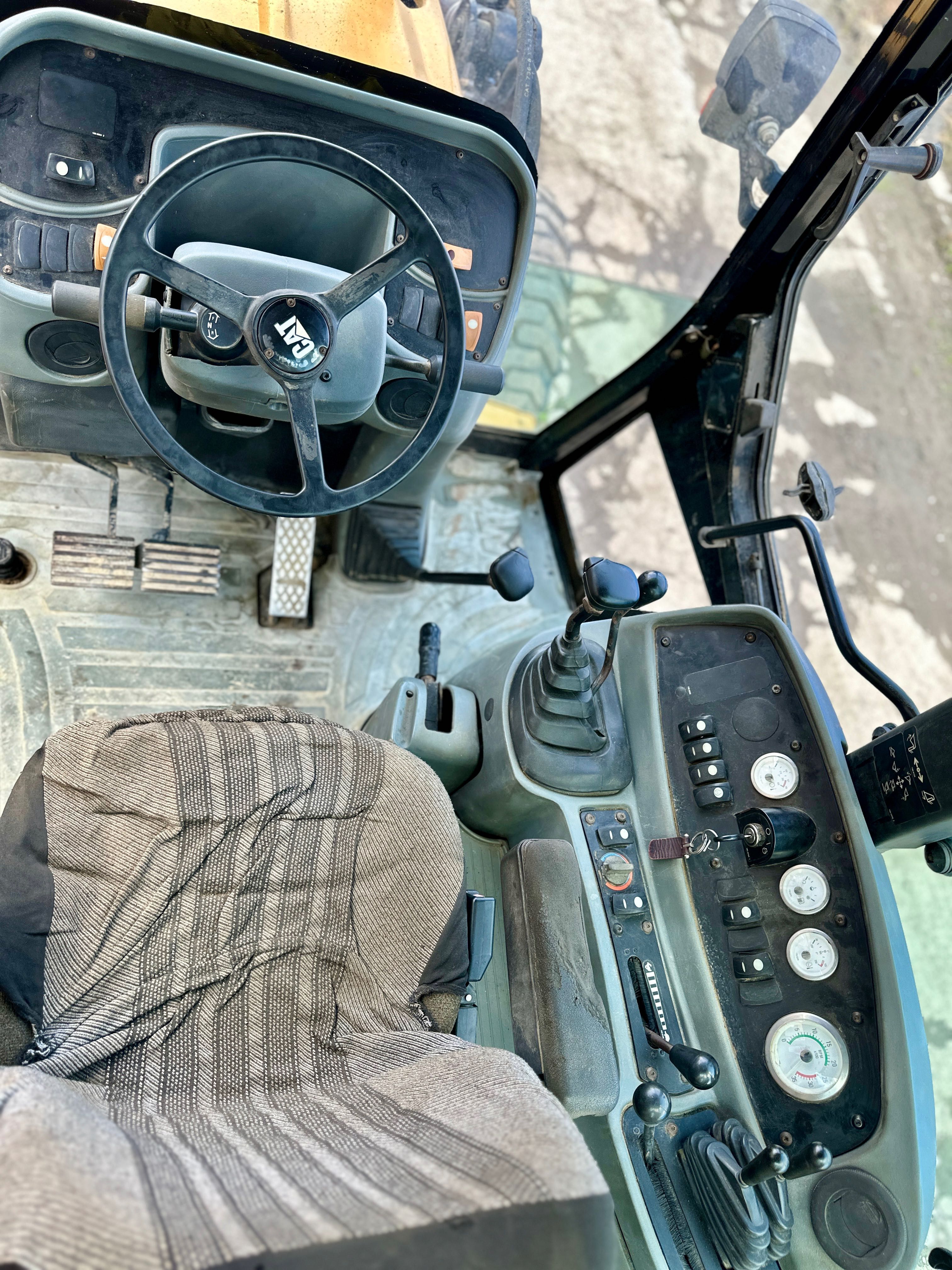 Buldoexcavator Cat / Caterpillar 428D