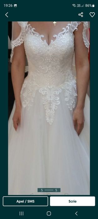 Rochie de  mireasă .