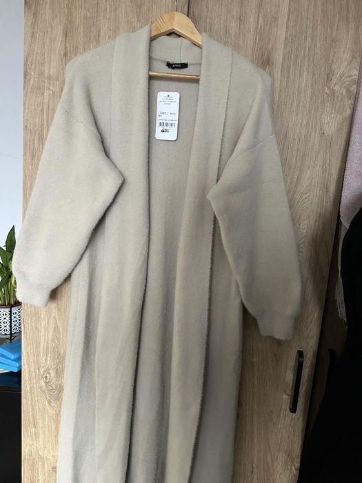 Дълга дебела жилетка