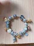 Pandora Gold талисмани