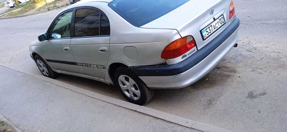 Машину Тайота Авенсис 2000г обмен на баранов