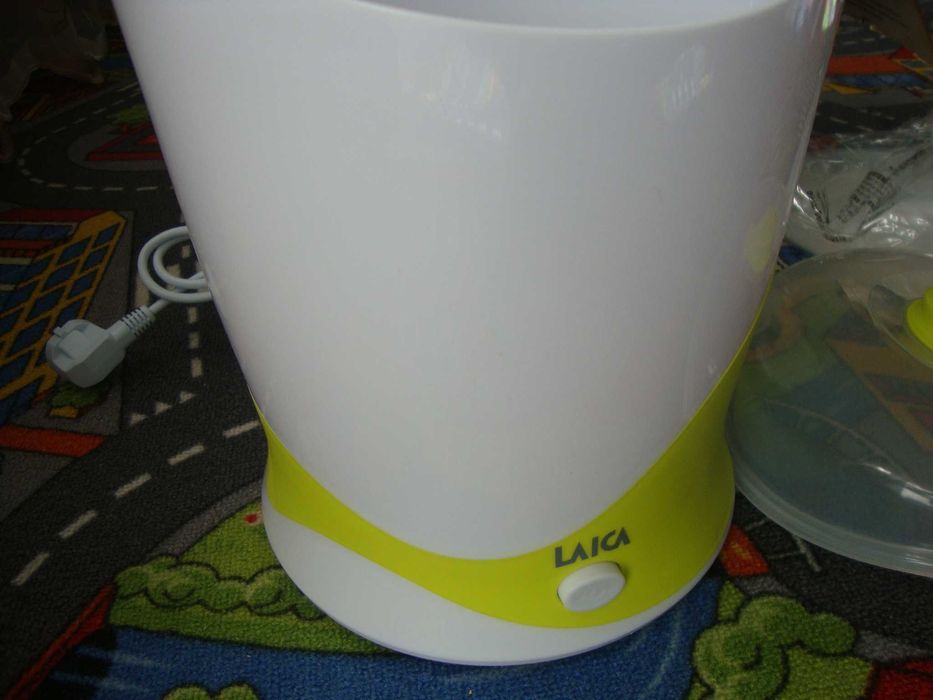 Sterilizator nou de biberoane cu aburi Laica BC1005+încălzitor Laica.