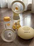 Medela двуфазна електрическа помпа за кърма Swing Flex + подарък