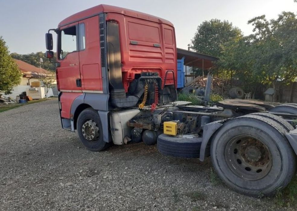 Man cap tractor de vanzare