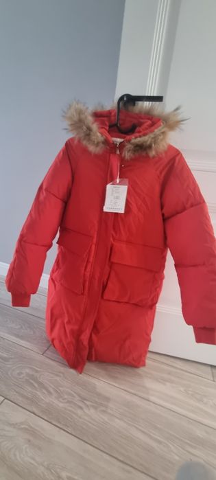 Продам пуховик новый