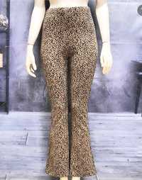 Продам женские обтягивающие брюки  с леопардовым принтом