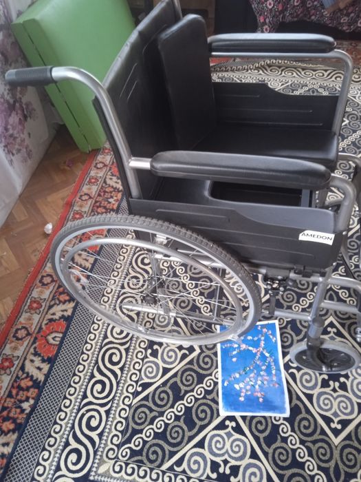 Инвалидная коляска