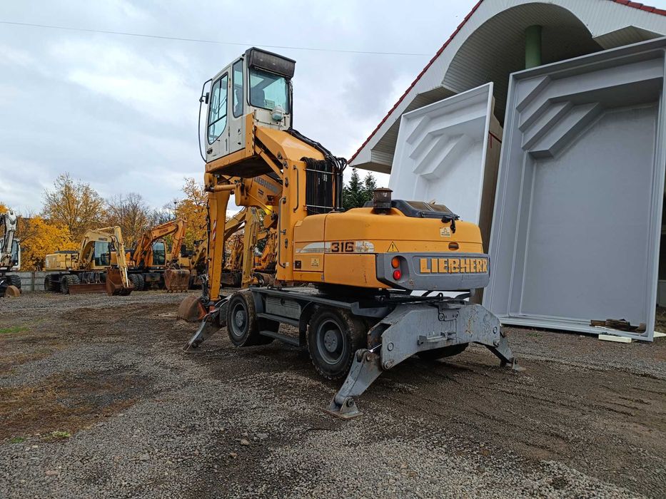 Excavator pe roti Liebherr A316, 21 tone, pentru manipulare, 2009