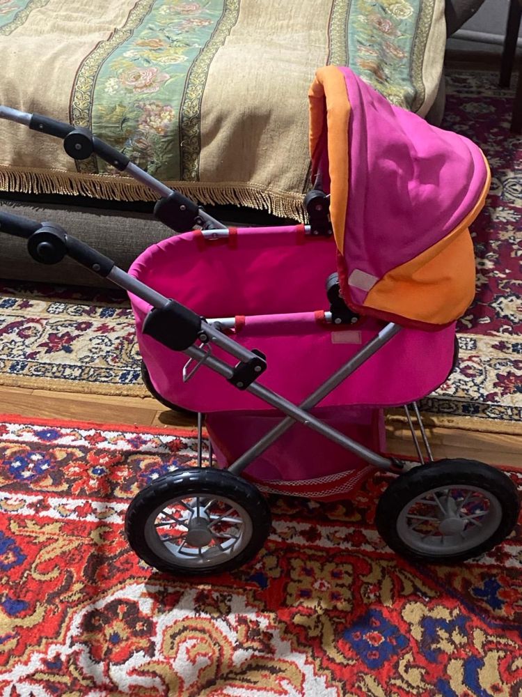 детская розовая коляска