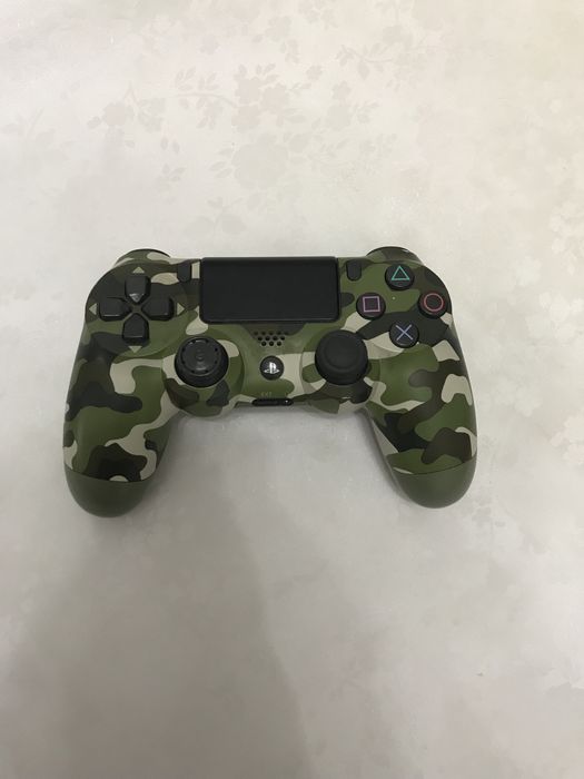 джостик для пс 4 бу вроде оригинал но это не точно