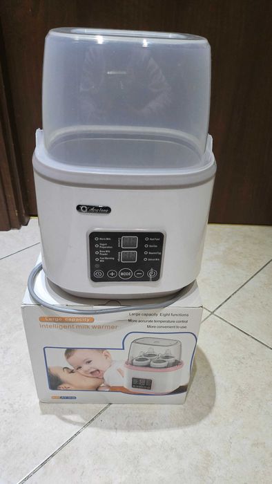 Уред за затопляне и стерилизиране на бебешки шишета