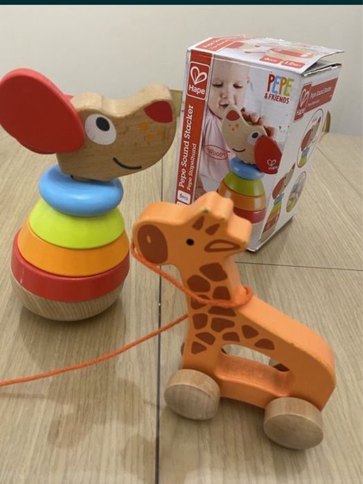 Развивающая игрушка. Пирамидка Щенок Hape и жираф