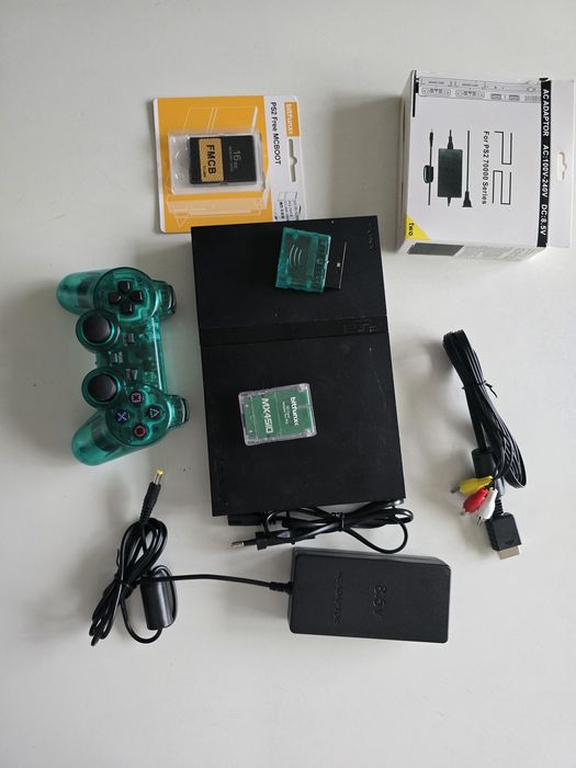 Sony PlayStation 2 slim SCPH 75004 modata cu jocuri si accesorii noi