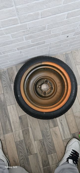 Roata rezerva slim de  Logan