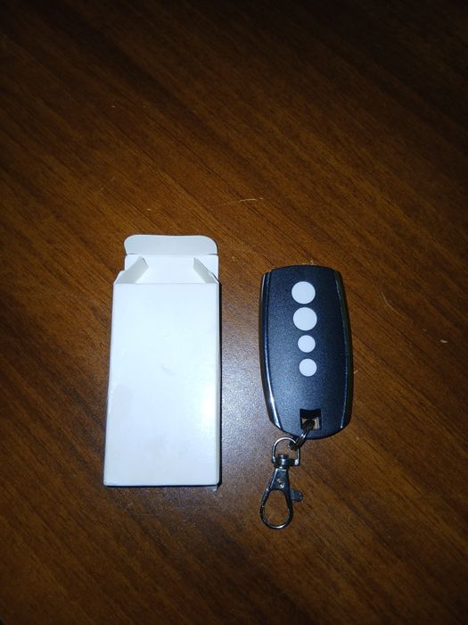 Telecomandă usă garaj