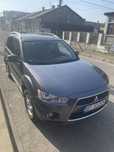 Vand Mitsubishi Outlander 2011