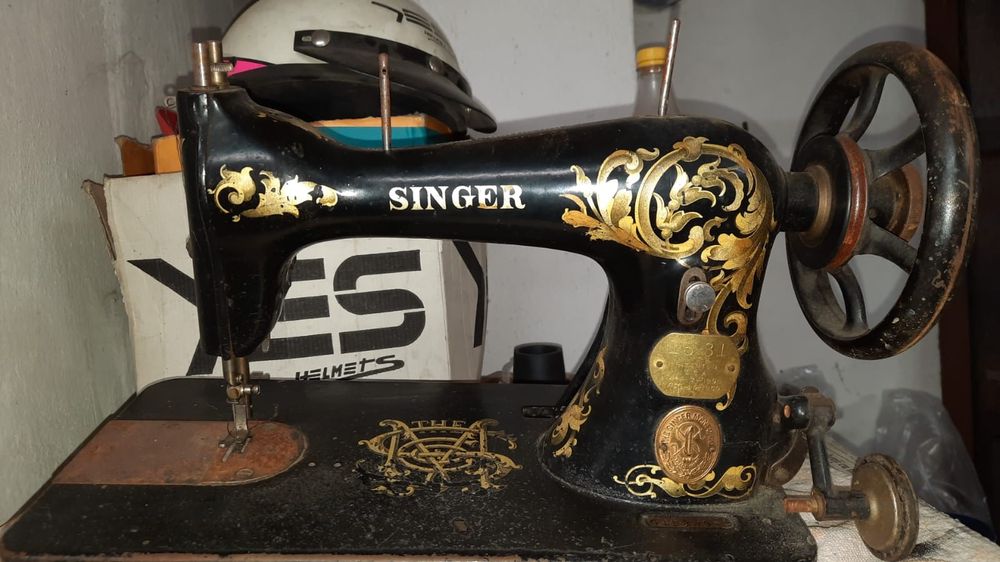 Mașină de cusut Singer
