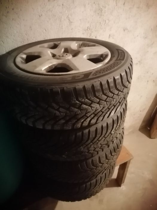 4бр.гуми с джанти и подарък тазове за Opel"Astra"-2010г.Размер205/70/1