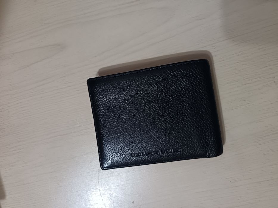 Портмоне сотилади.