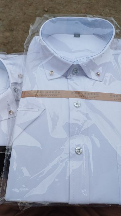 Рубашки школьные новые