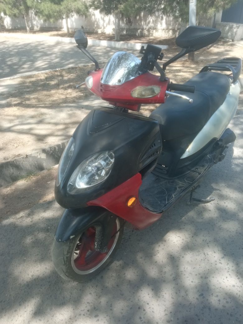 Kawasaki skuter firminniy yili 2016