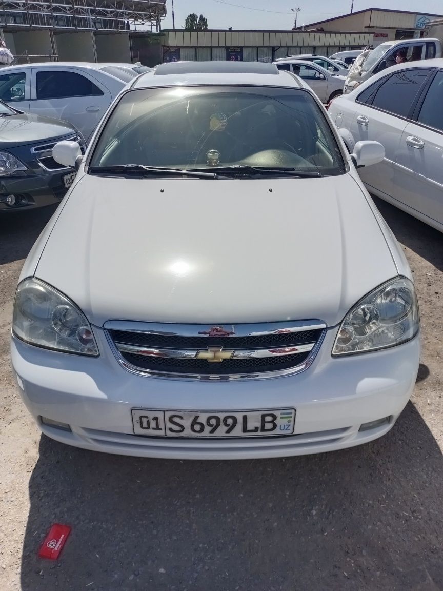 Laseti  Chevrolet 2013 yil xolati alo  avtomat  139ming yurgani halol