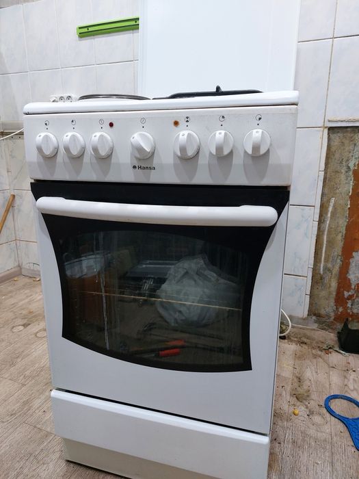 Продам комбинированный газплиту вместе с балоном