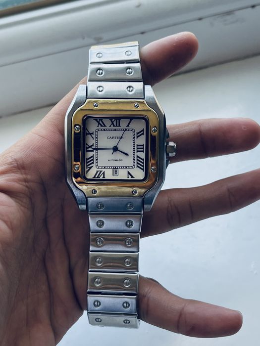 Часы от бренда CARTIER