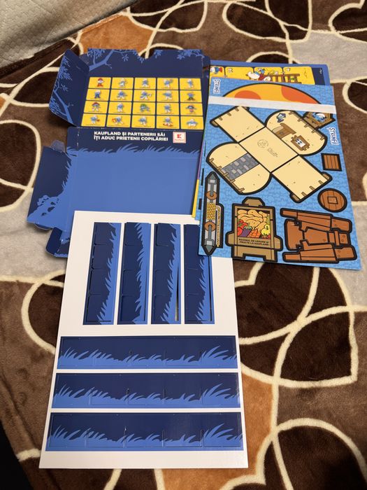 Catalog / cutie Strumfi Kaufland + 2 jocuri/ Schimb cu colectia de 20