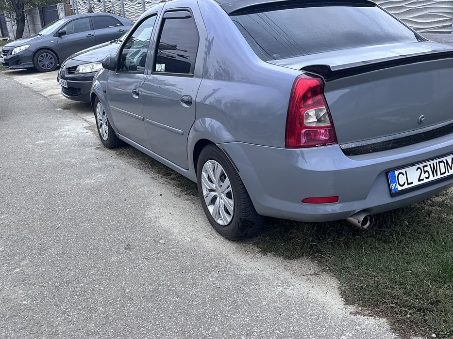 Vand logan 1 an 2005 ac funtional, acte la zi