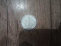 Moneda din 1999.