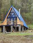 Cabana stil A-Frame si case din structura de lemn