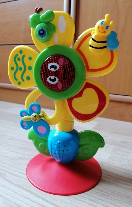 Jucărie interactiva "Floare cu insecte"