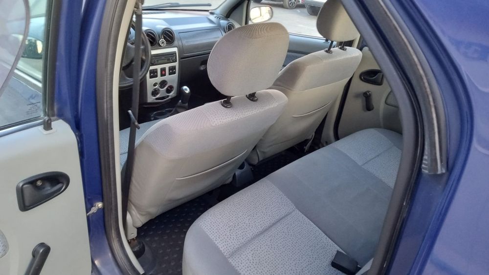Vand dacia logan full  16 benzina km 100314 reali  merge ca noua