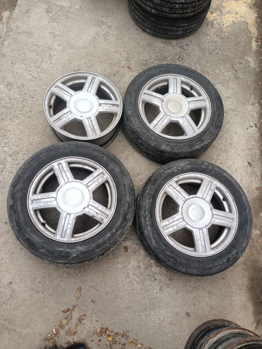 Продам титан с покрышкой