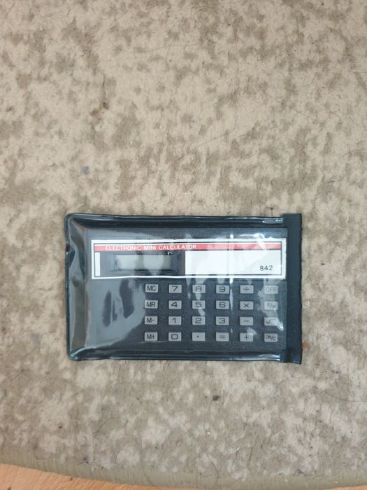 mini calculator electronic de epocă