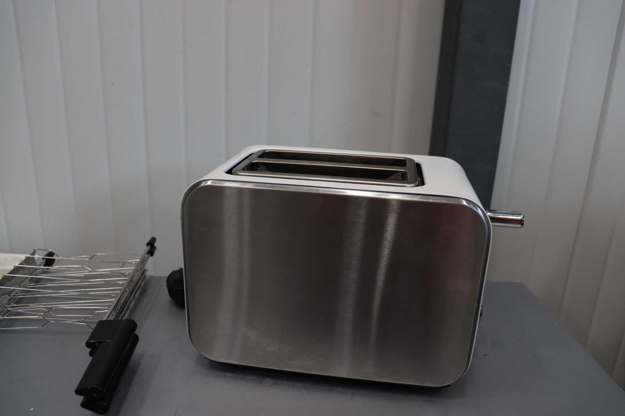 De'Longhi Тостер с щипки,3 функции, 550W , сребрист, НЕ РАБОТИ!