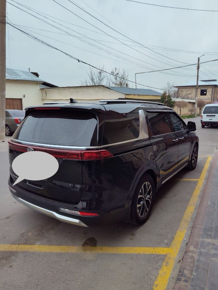 Kia Carnival (полной комплектацией)
