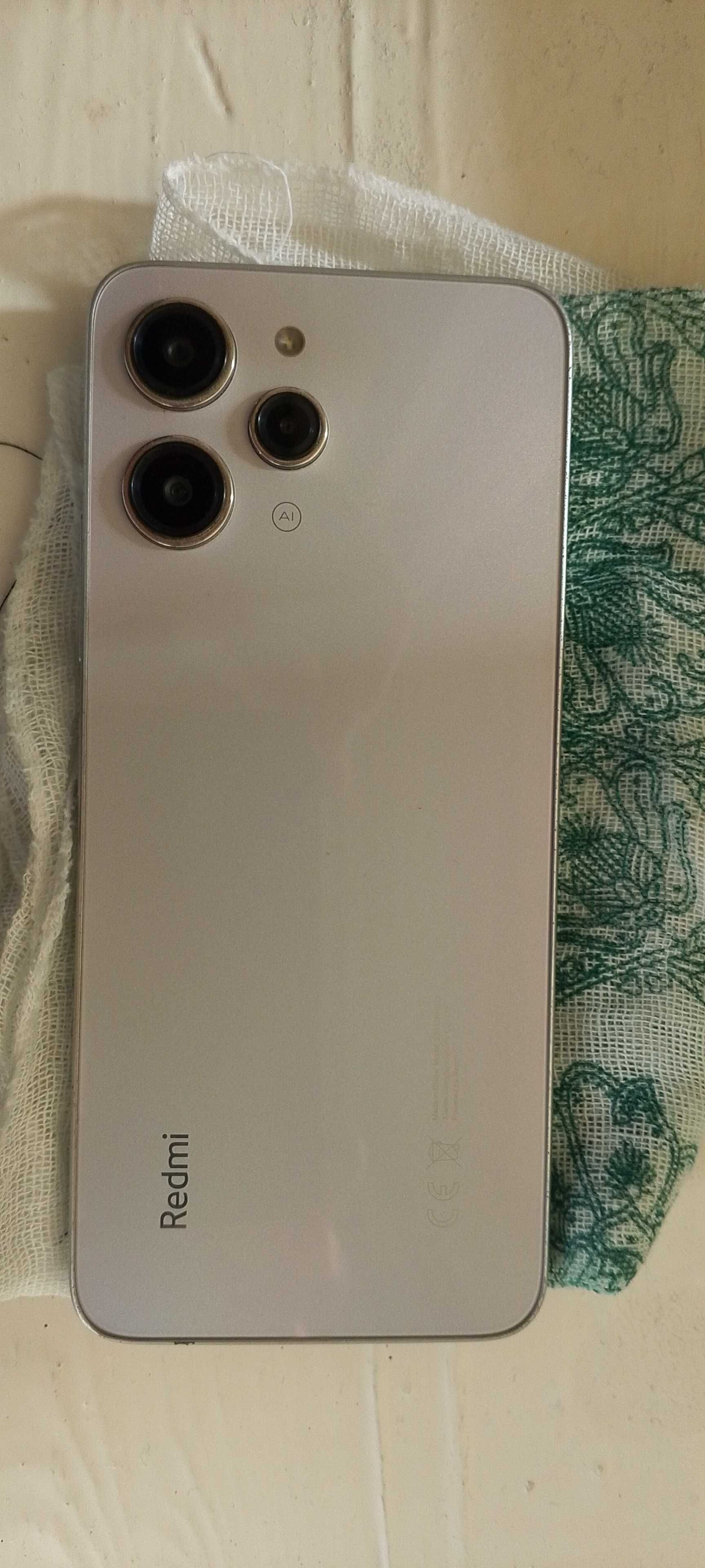 Redmi.        12