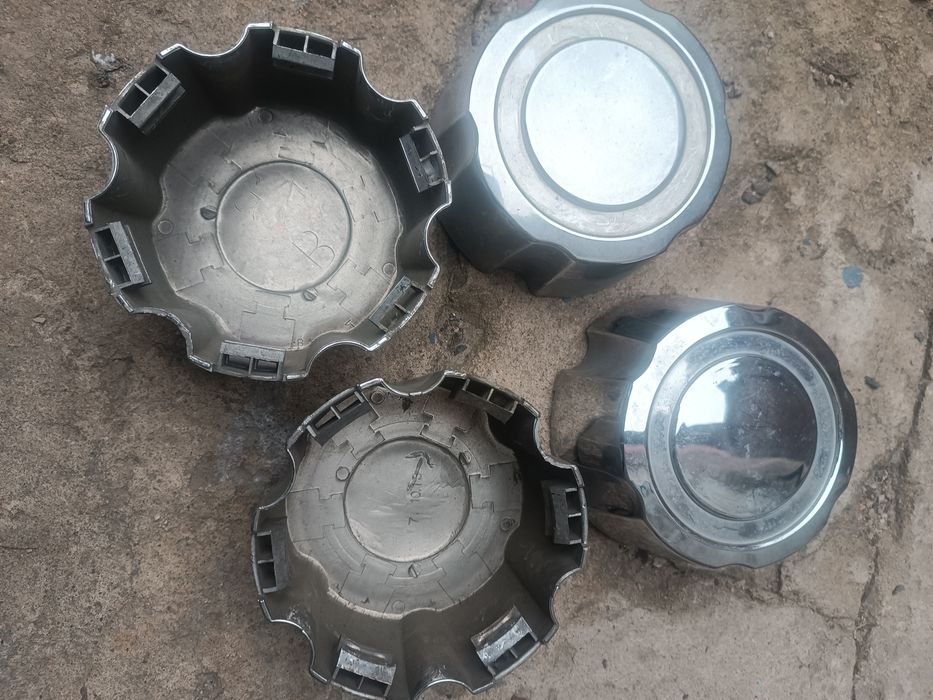 Колпачки на делику