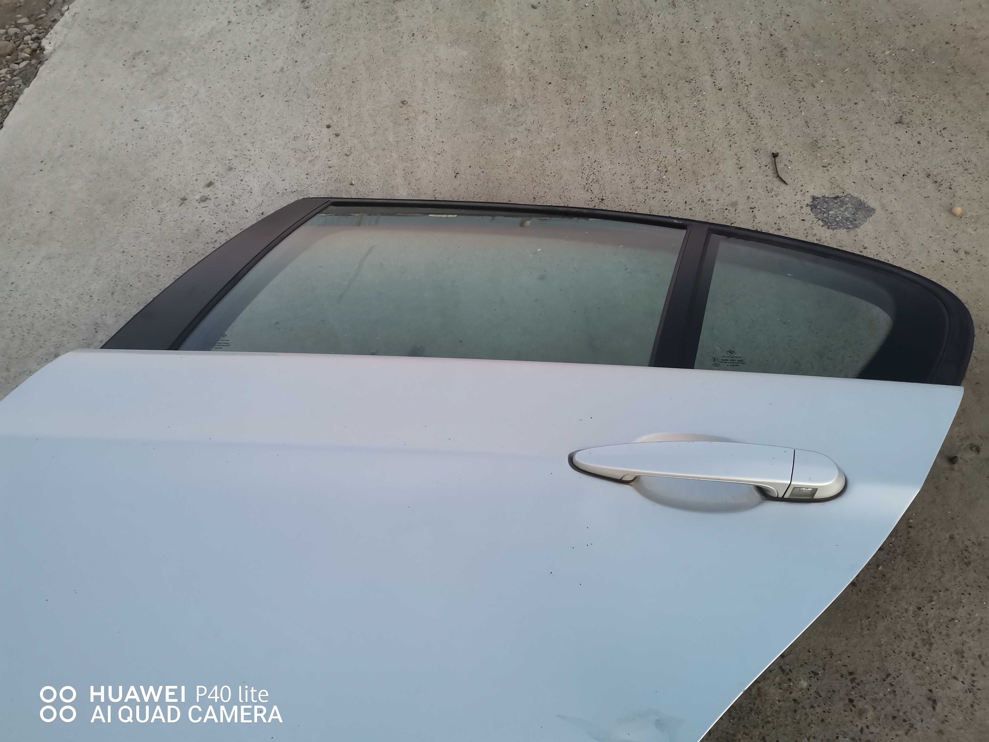 Macara electrica ,broasca,geam,maner, ușa stânga spate Bmw e90