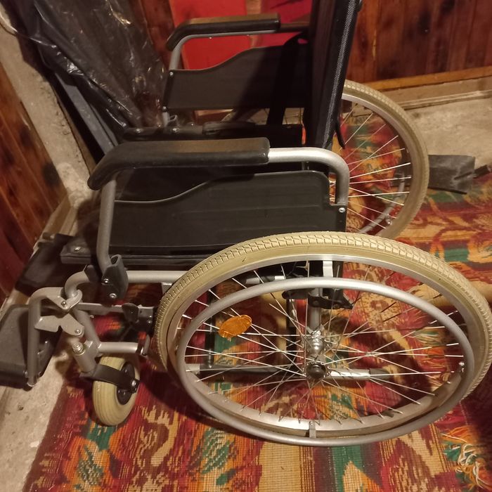 инвалидна количка.