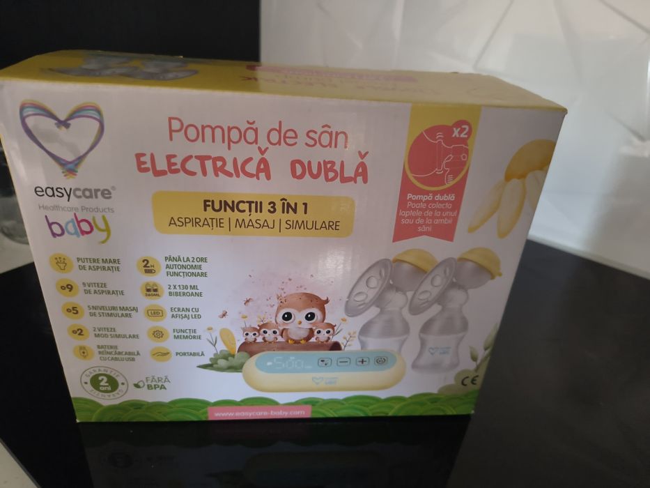 Vând pompă de sân dublă