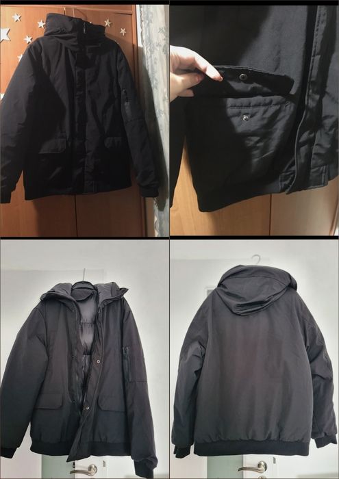 Geacă cu glugă, neagră, căptușită, cu multe buzunare, potrivită pentru