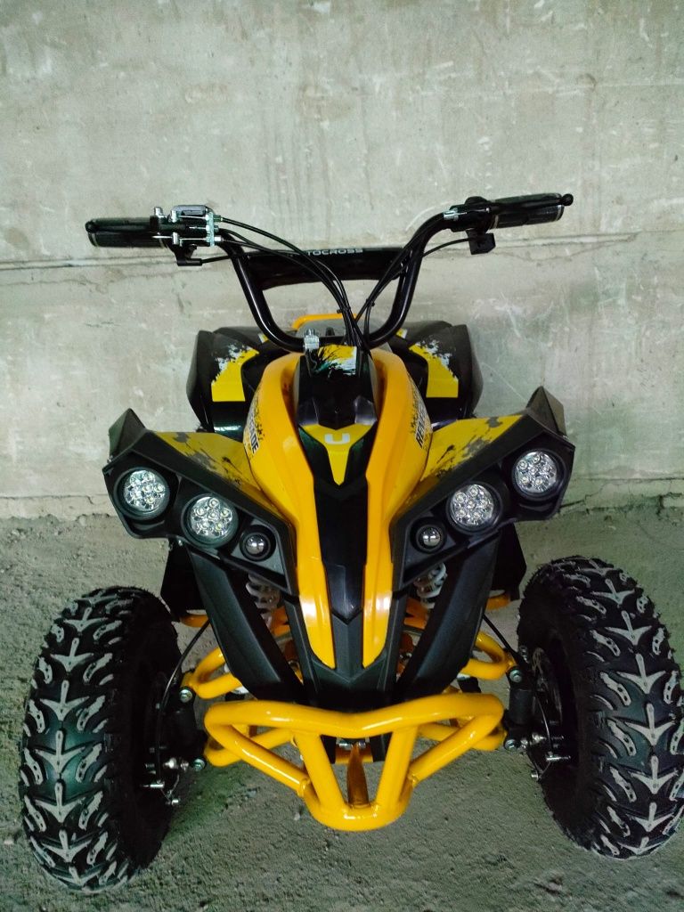 Atv Renegade pe benzina pentru copii 49cc pornire la buton si sfoara