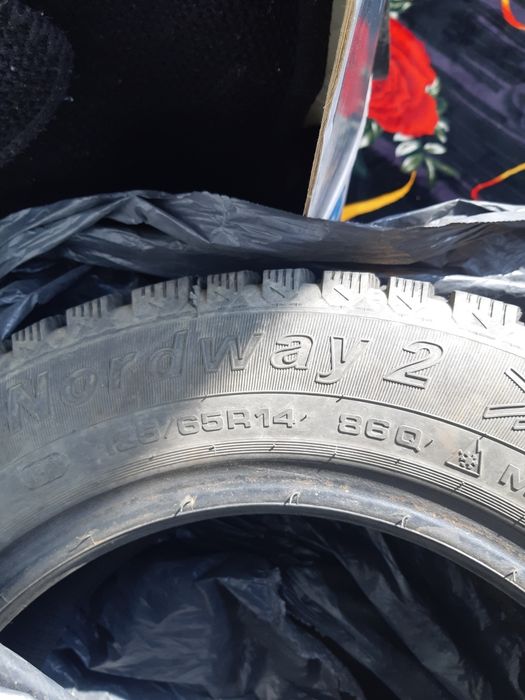 Продам шины 185/65R14 зимние-шипы, новые,ездил только один сезон,.